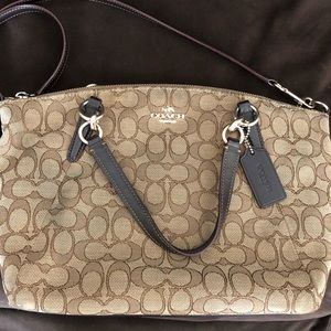 Signature coach satchel .